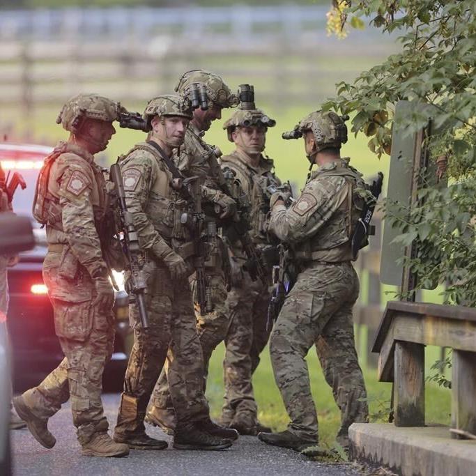 Fugitive killer eludes Pennsylvania police for eighth day as wary residents keep a watchful eye